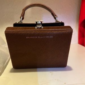 Brandon Blackwood brown pony hair trunk